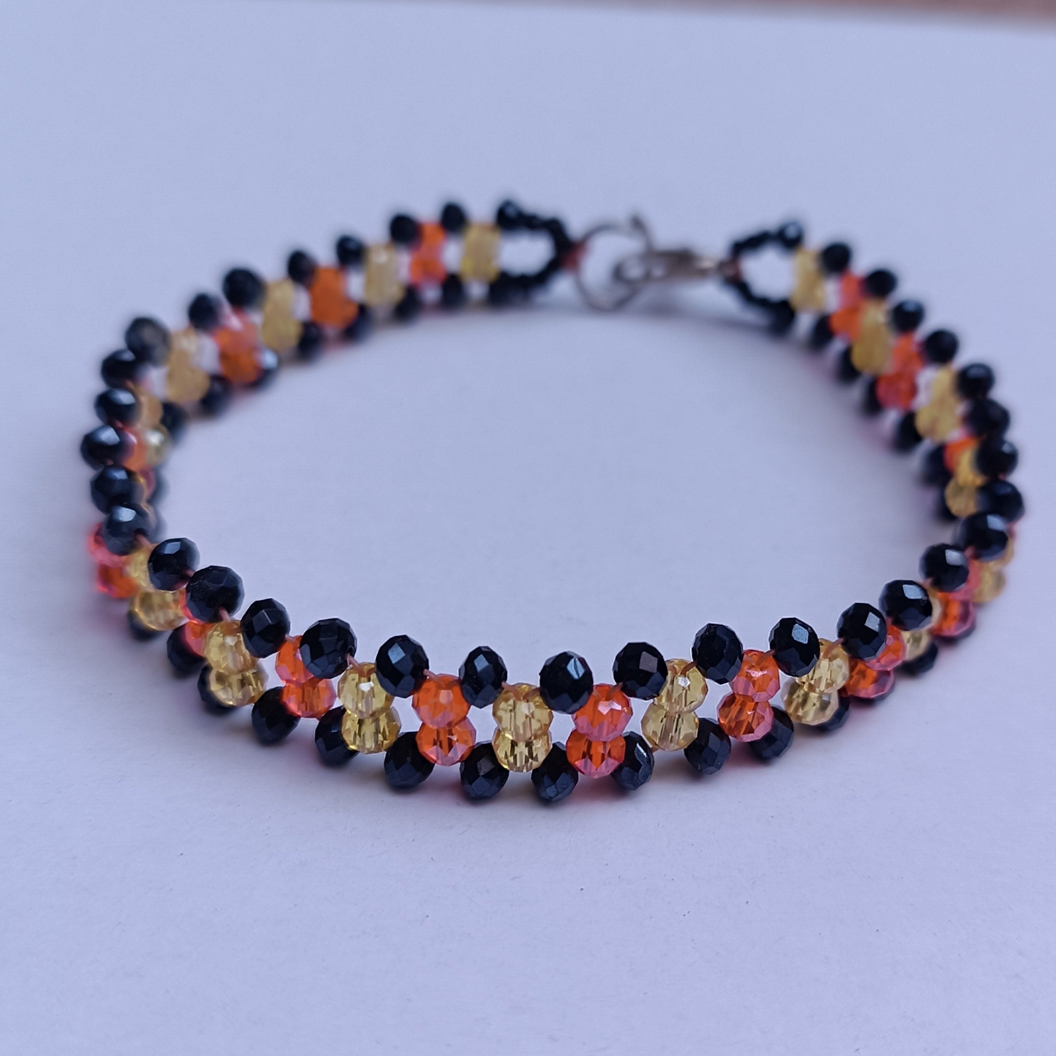 Handmade Crystal Beaded Bracelet – Black, Orange & Yellow