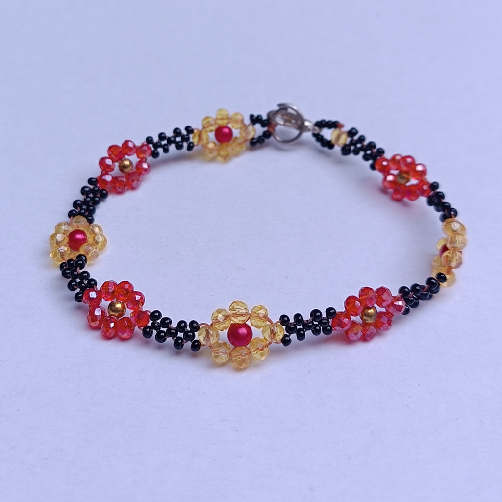Handmade Black Seed-Bead Bracelet with Red & Yellow Flower Accents