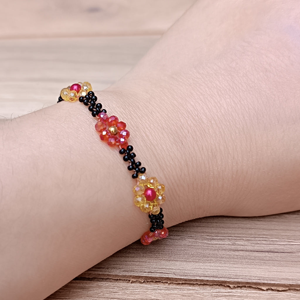 Handmade Black Seed-Bead Bracelet with Red & Yellow Flower Accents