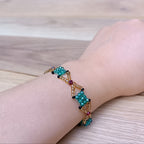 Handmade Bracelet with Emerald blue & Golden Glass Beads